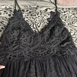Beautiful lacey black dress size large brand new with tags